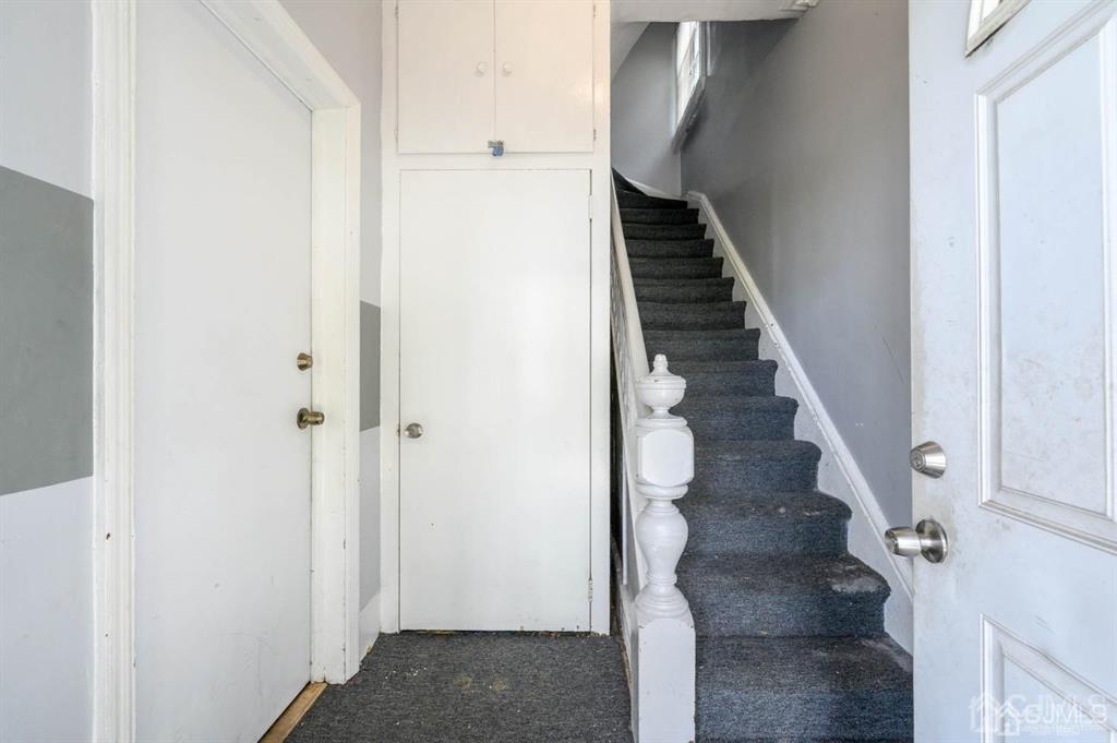 8 Ricord Street Newark, NJ 07106 - Photo 3 of 39 a view of entryway and gallery with wooden floor