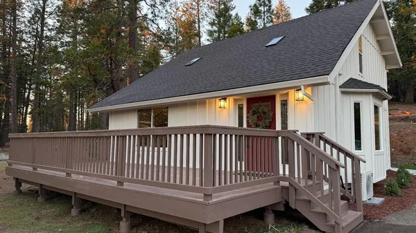 a view of a house with a deck