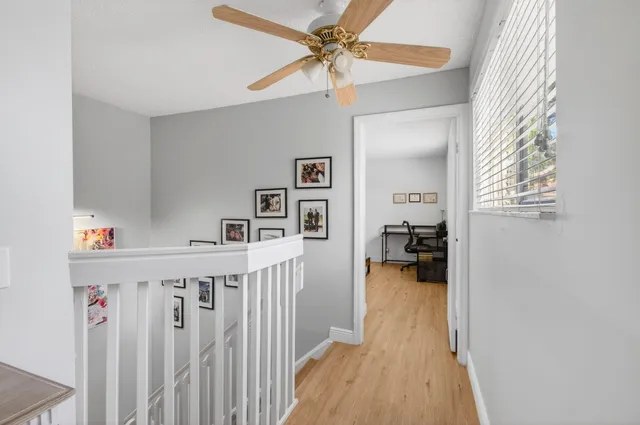 a workspace with furniture and a window