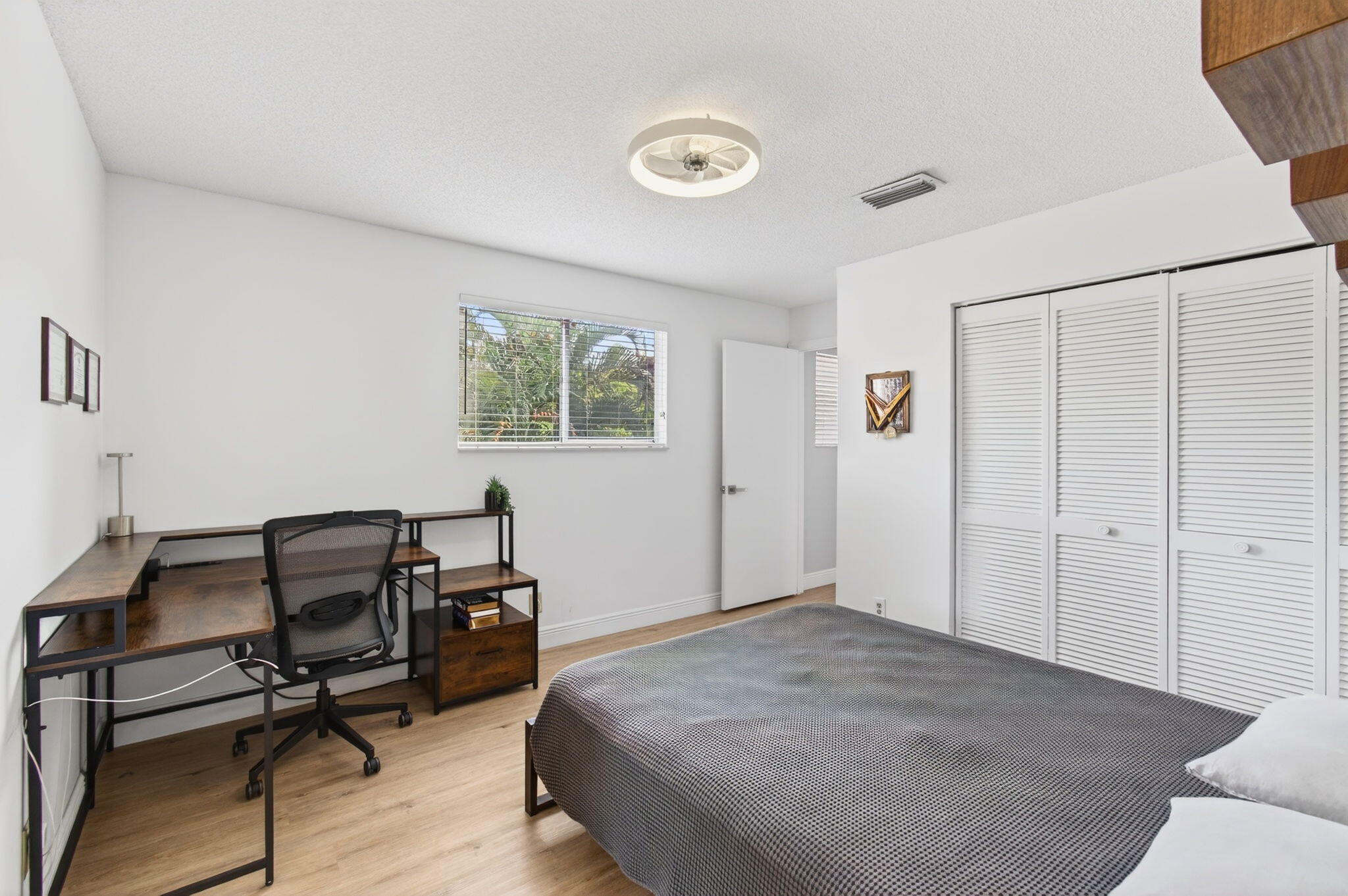 6766 Via Regina Boca Raton, FL 33433 - Photo 23 of 57 a workspace with furniture and a window