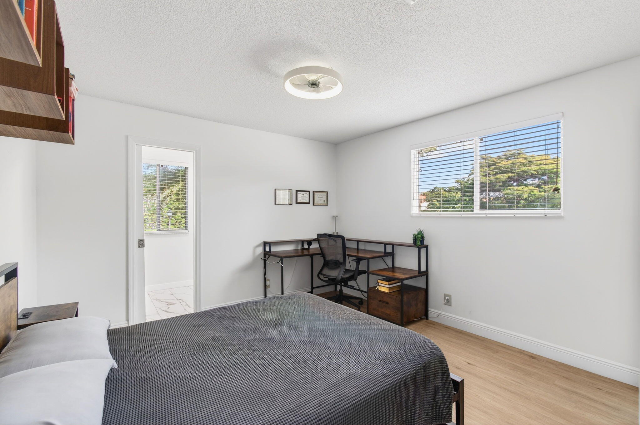 6766 Via Regina Boca Raton, FL 33433 - Photo 25 of 57 a bedroom with a bed and a window
