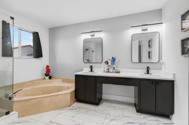 a bedroom with a bed and dresser