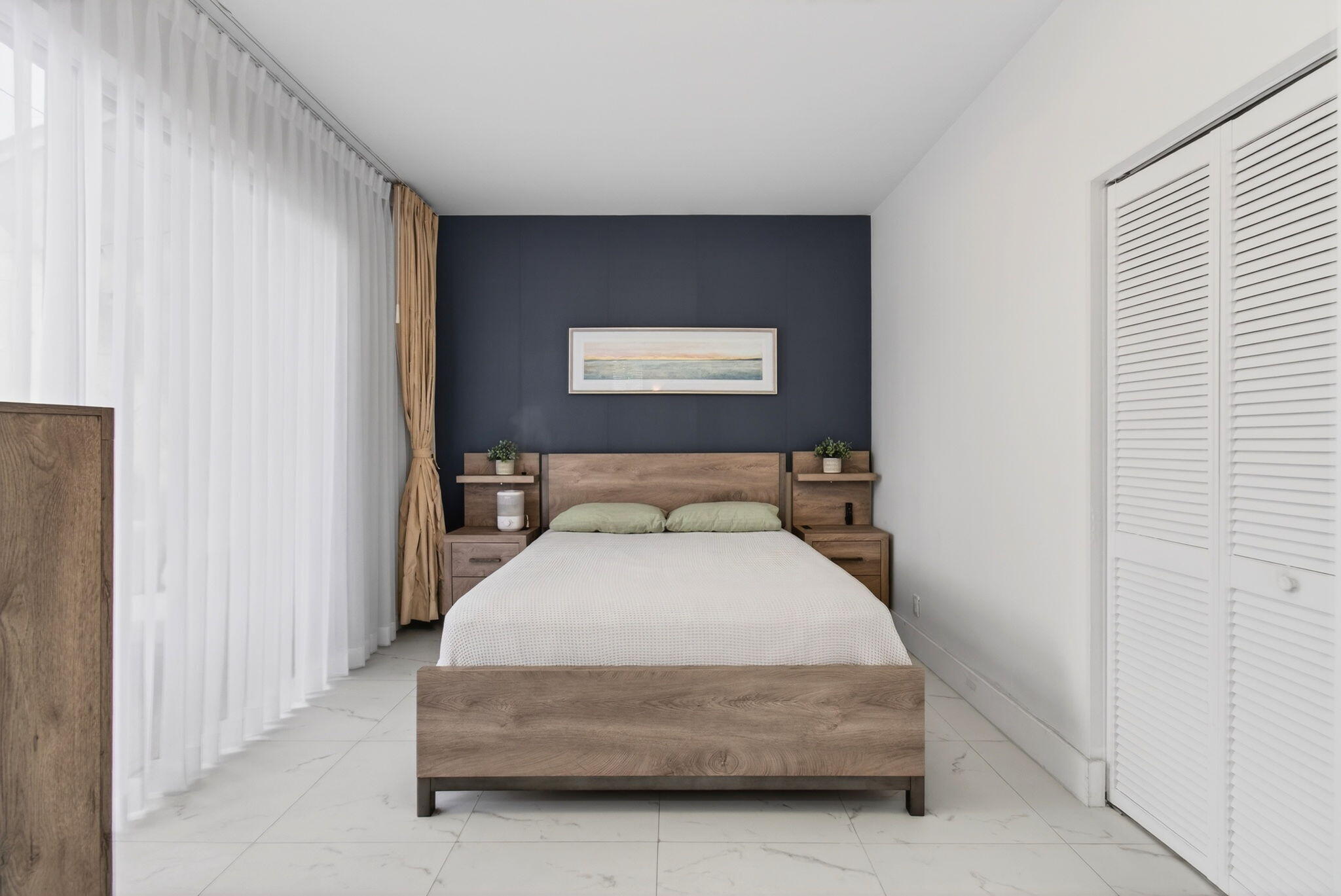 6766 Via Regina Boca Raton, FL 33433 - Photo 37 of 57 a bedroom with a bed and window