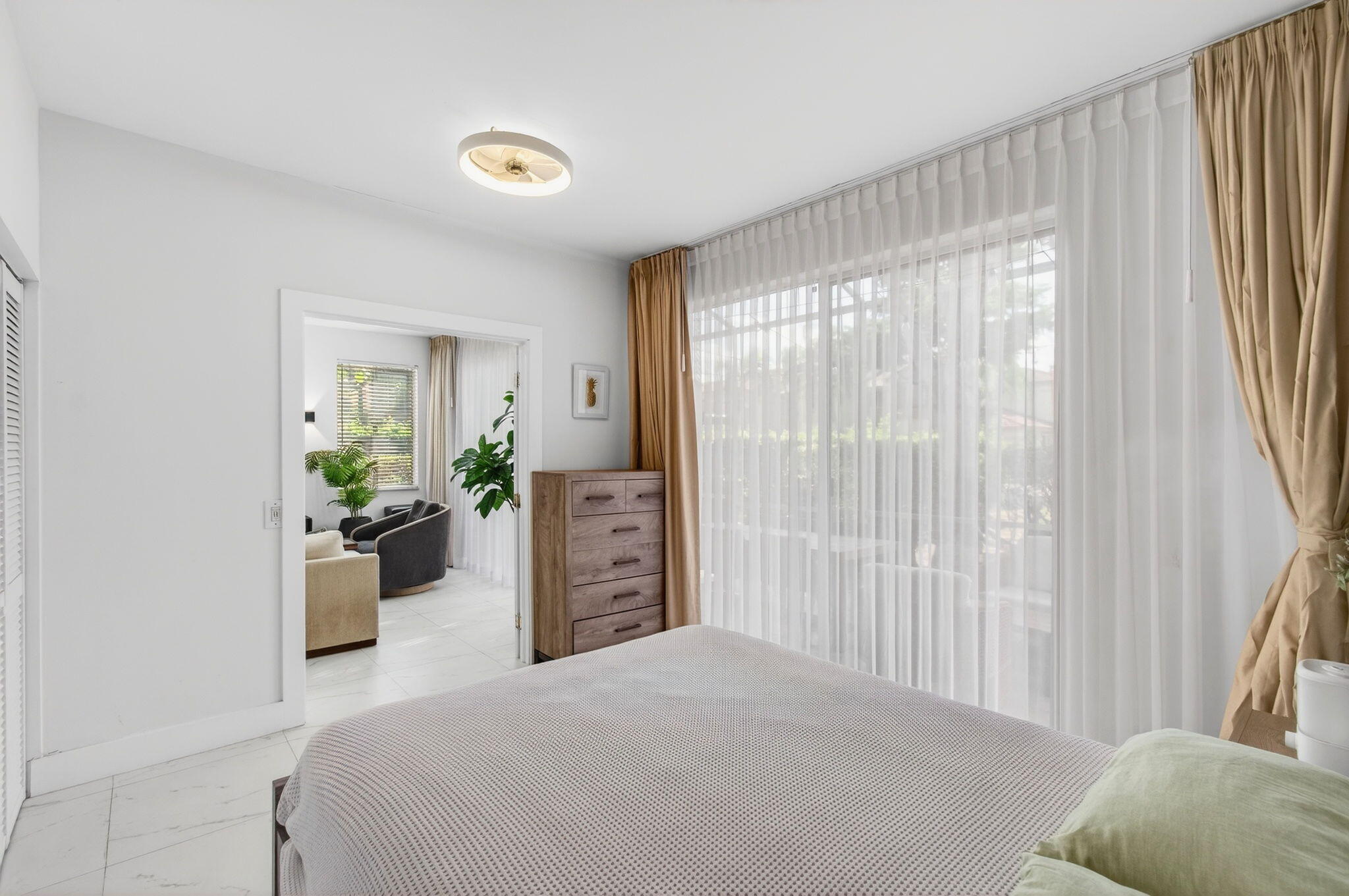 6766 Via Regina Boca Raton, FL 33433 - Photo 39 of 57 a bedroom with a bed and a couch