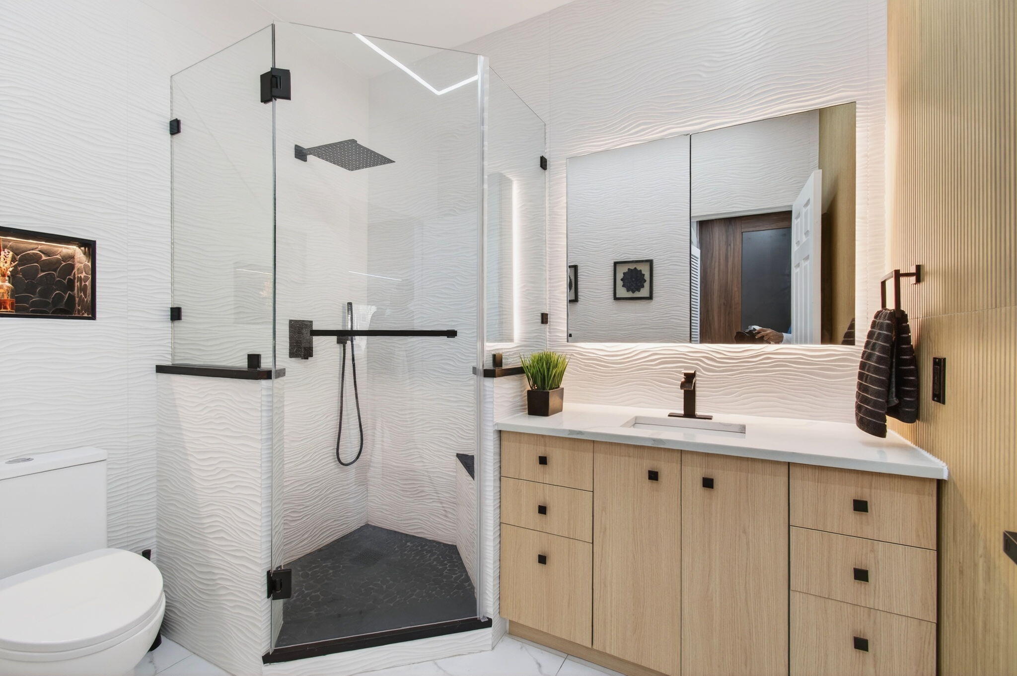 6766 Via Regina Boca Raton, FL 33433 - Photo 40 of 57 a bathroom with a sink a toilet and a mirror