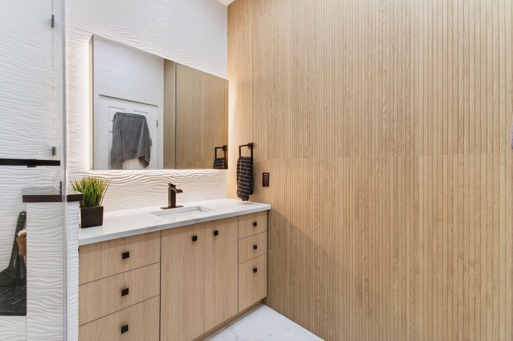 6766 Via Regina Boca Raton, FL 33433 - Photo 42 of 57 a bathroom with a sink and a mirror