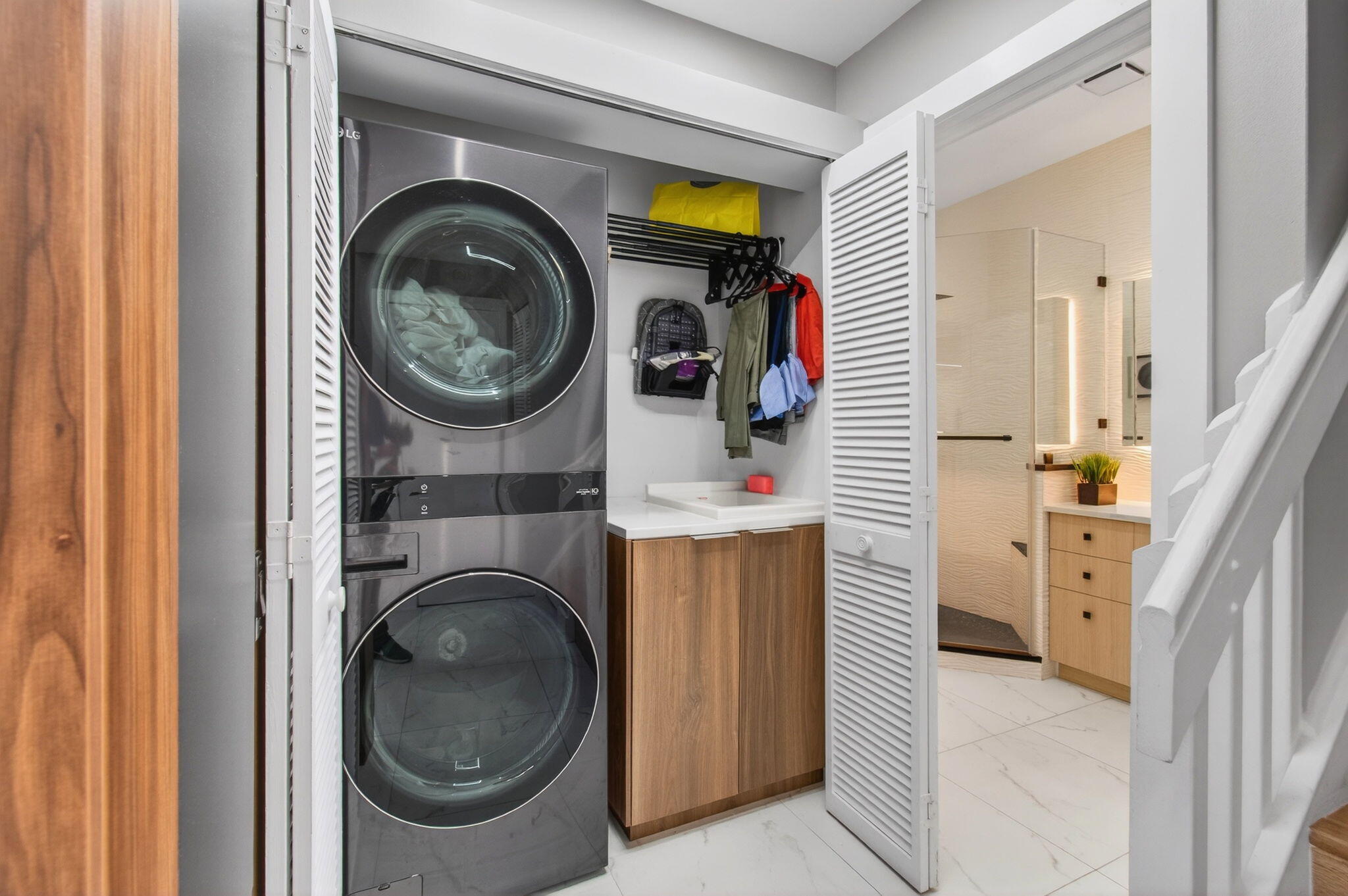 6766 Via Regina Boca Raton, FL 33433 - Photo 43 of 57 a utility room with dryer and washer