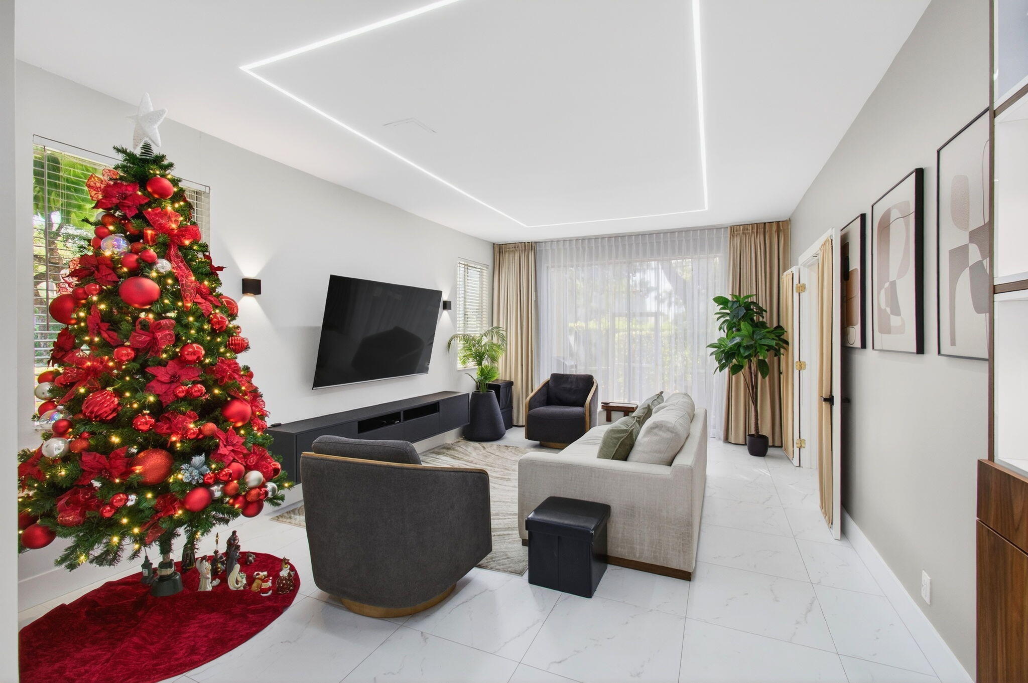 6766 Via Regina Boca Raton, FL 33433 - Photo 5 of 57 a living room with furniture and a flat screen tv