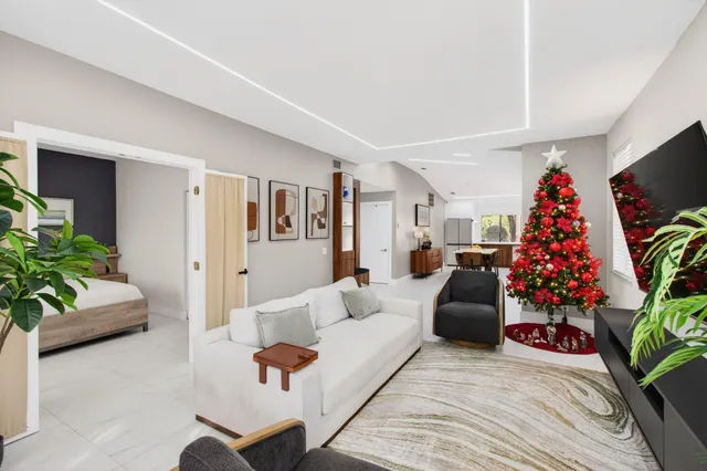 a kitchen with stainless steel appliances kitchen island granite countertop a sink and cabinets