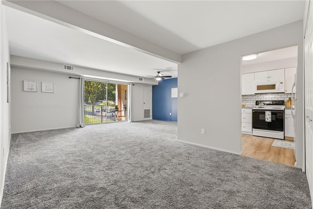 551 Sloop Road, Unit 67 Pittsburgh, PA 15237 - Photo 10 of 39 Neutral paint and carpet welcome you to the living space.