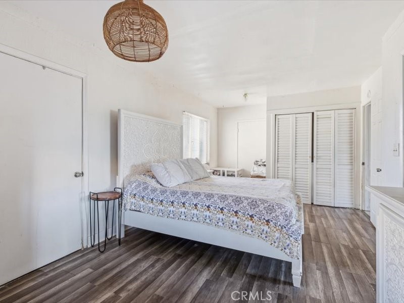 19876 Lodema Road Apple Valley, CA 92307 - Photo 21 of 40 a bedroom with a bed and a window