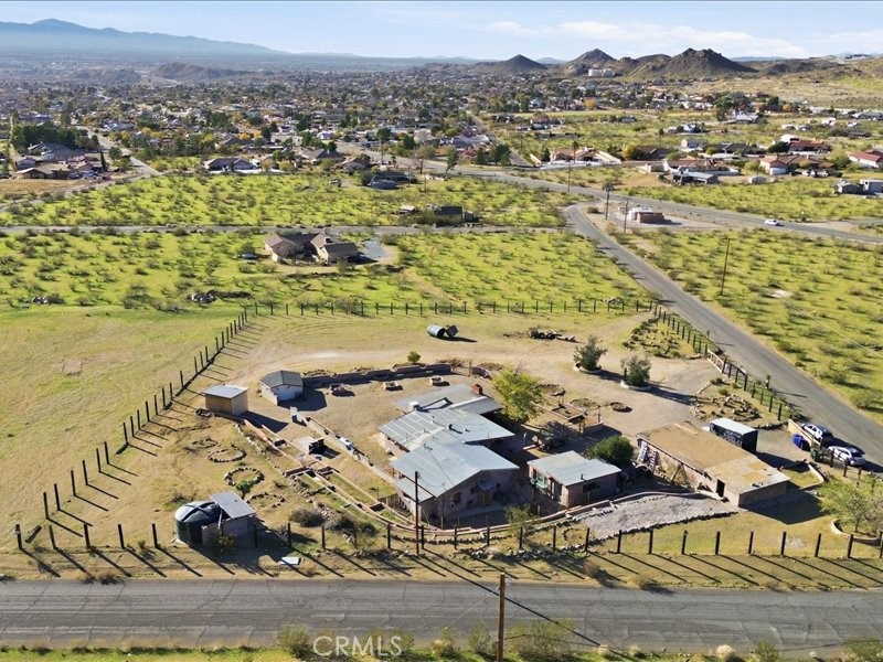 19876 Lodema Road Apple Valley, CA 92307 - Photo 10 of 40 an aerial view of residential houses with outdoor space