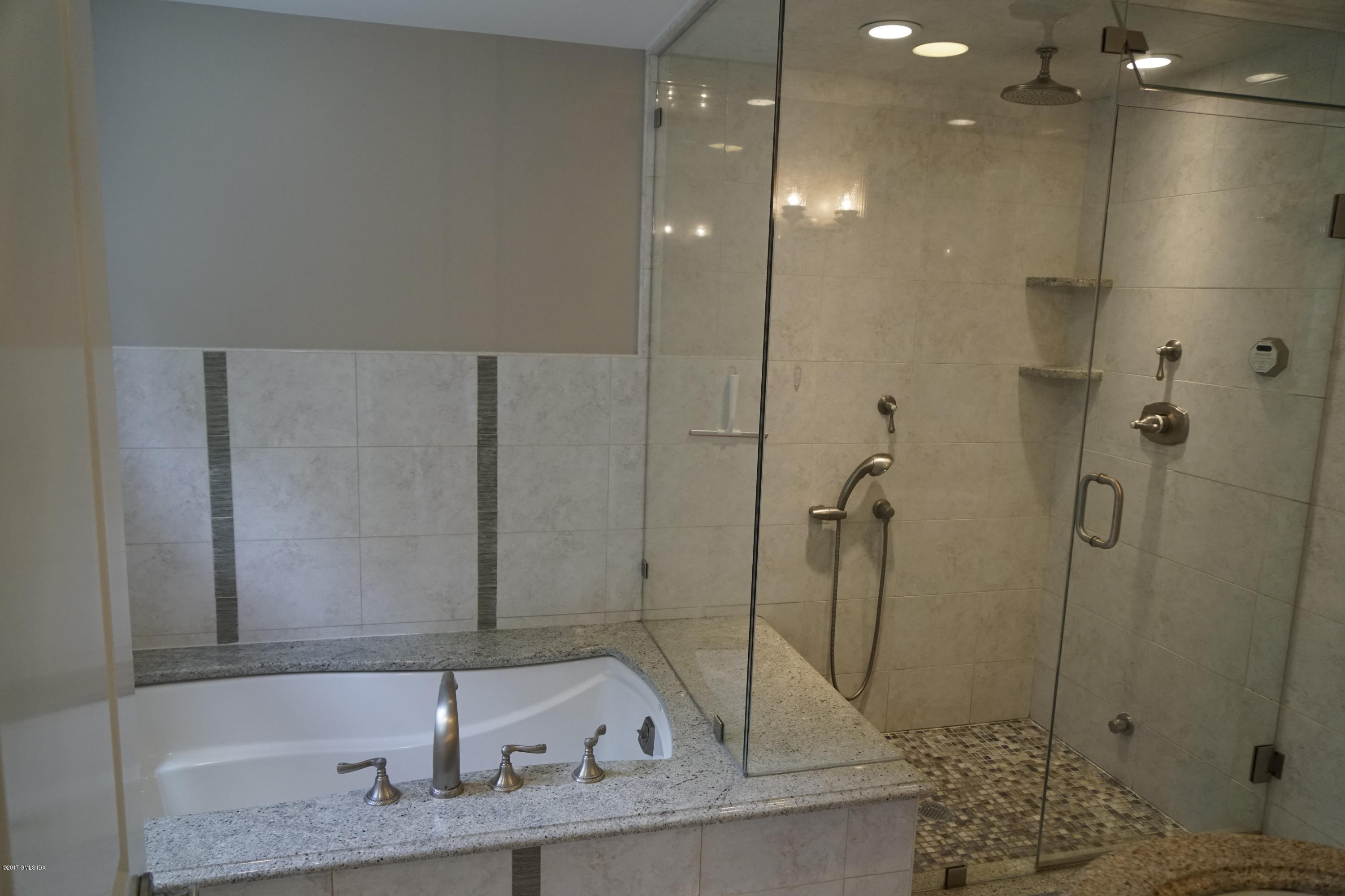 12 Birdsong Place Riverside, CT 06878 - Photo 13 of 30 a bathroom with a granite countertop sink and shower