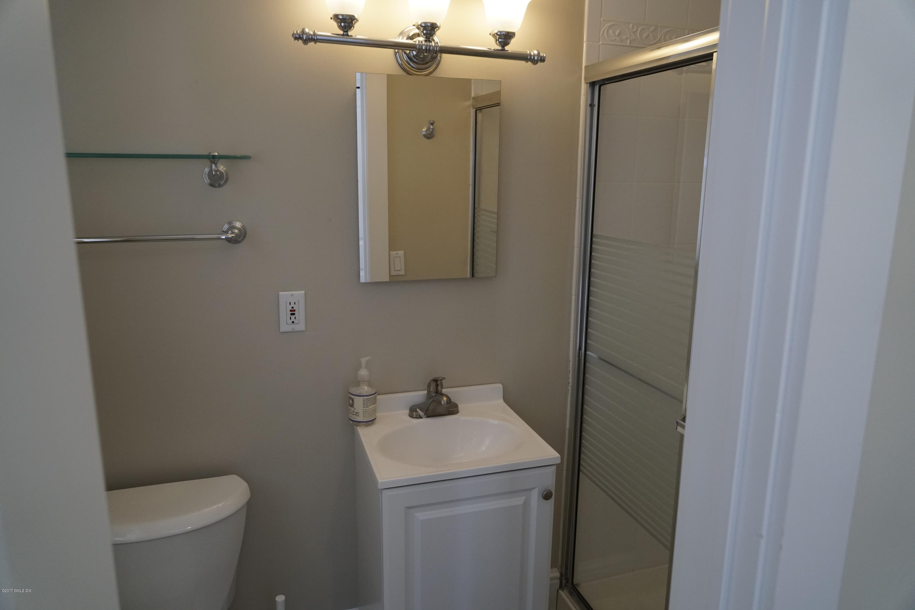 12 Birdsong Place Riverside, CT 06878 - Photo 25 of 30 a bathroom with a sink and toilet