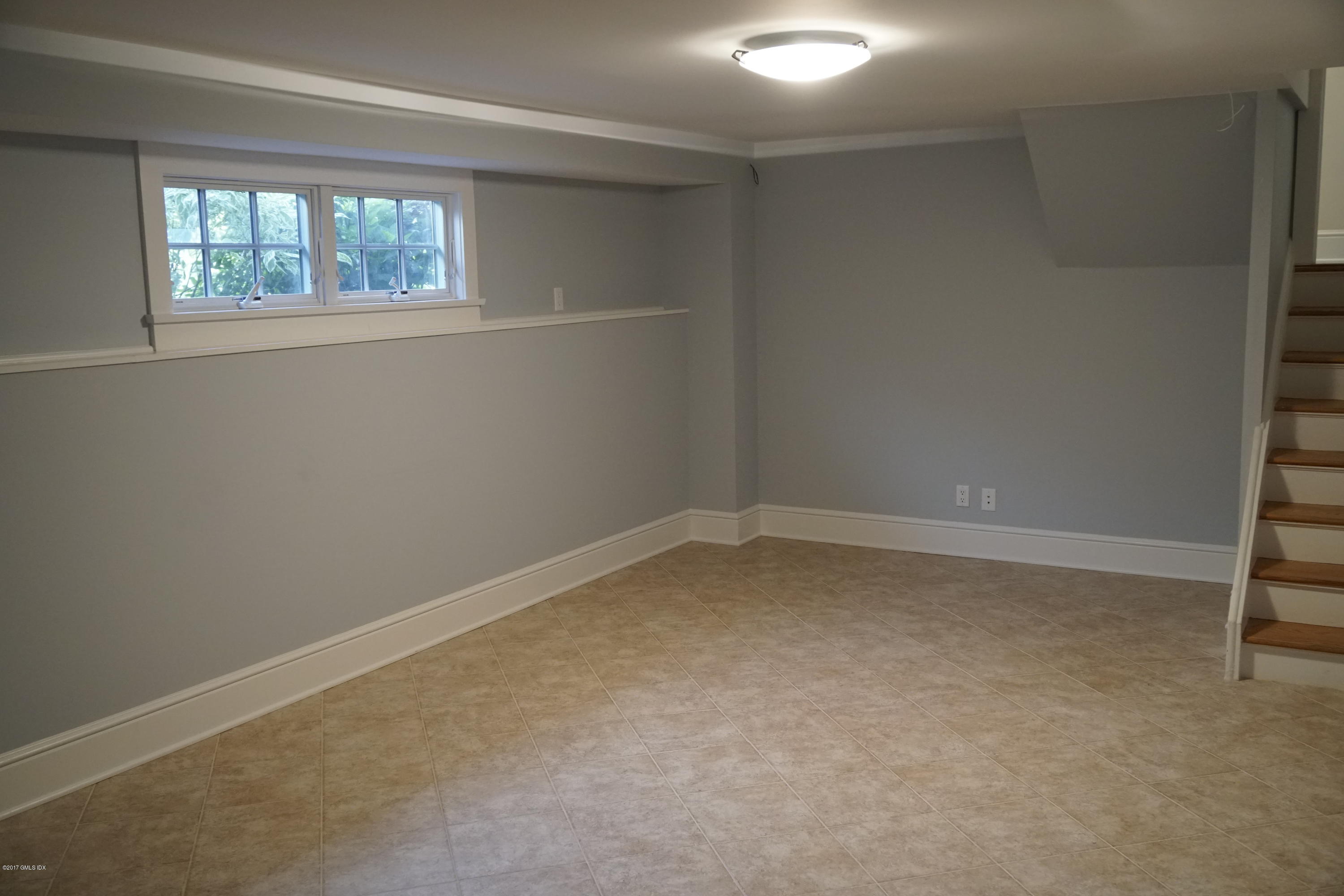 12 Birdsong Place Riverside, CT 06878 - Photo 26 of 30 an empty room with a window