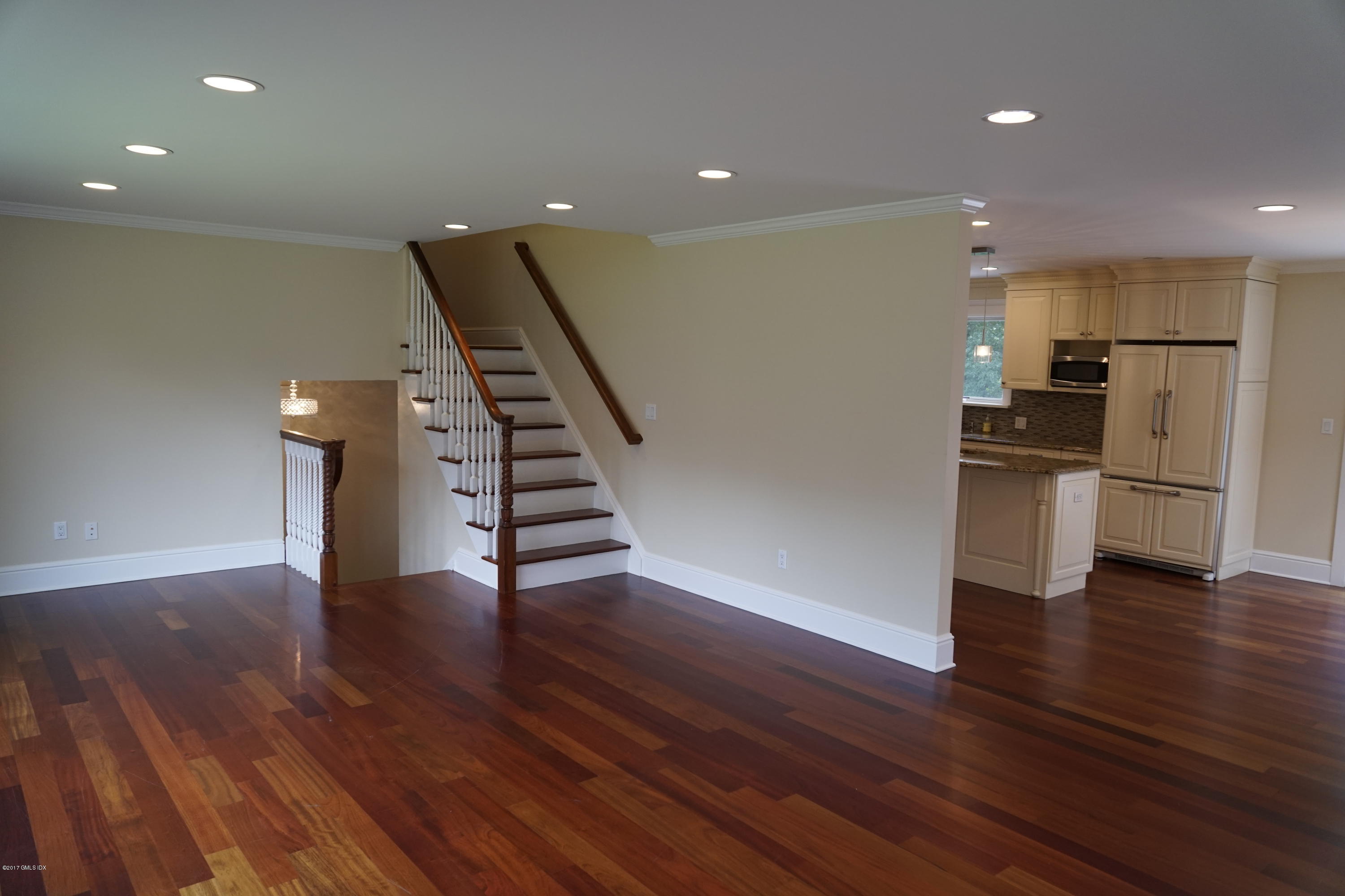12 Birdsong Place Riverside, CT 06878 - Photo 8 of 30 a view of a kitchen with wooden floor and electronic appliances