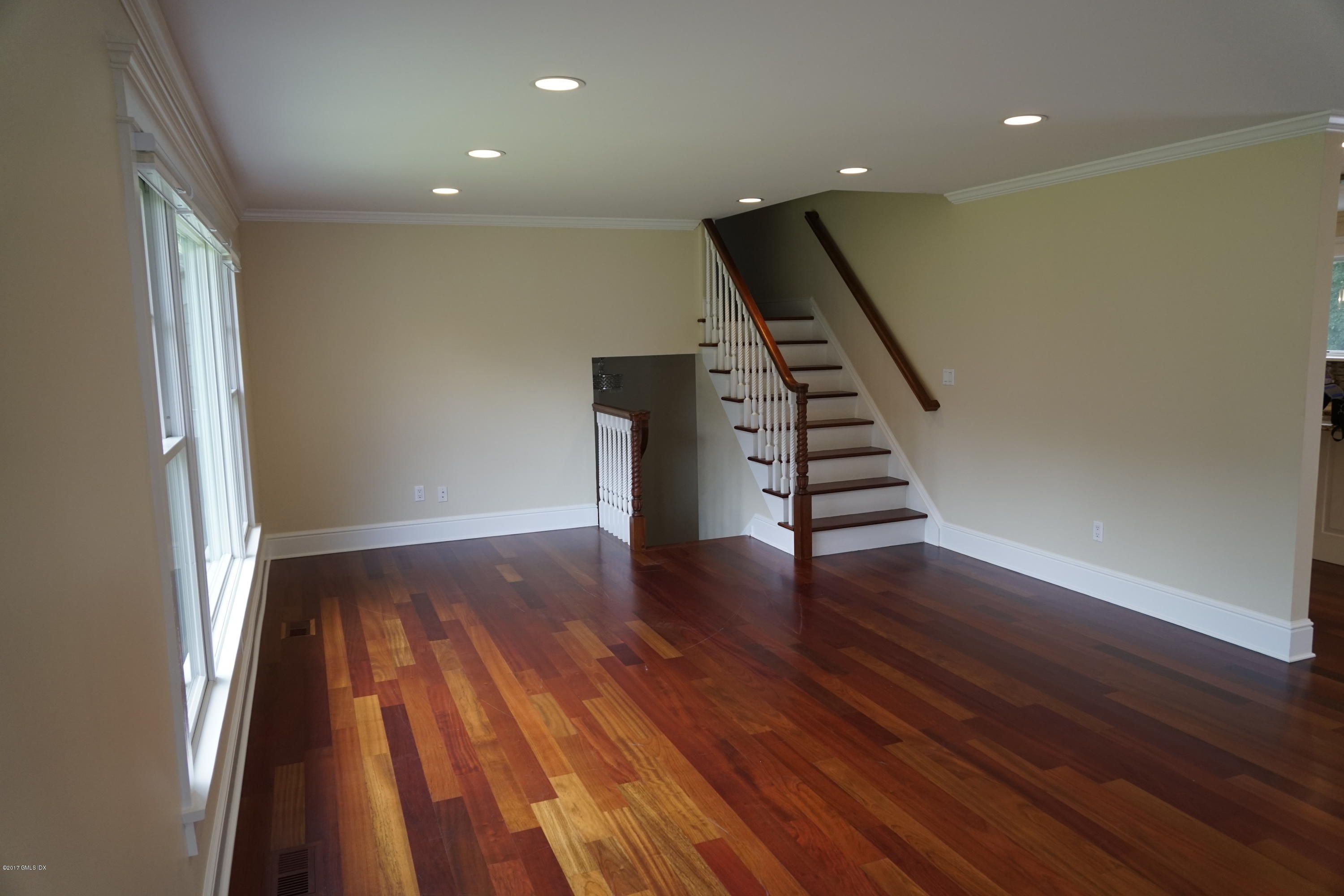 12 Birdsong Place Riverside, CT 06878 - Photo 9 of 30 an empty room with wooden floor and entryway