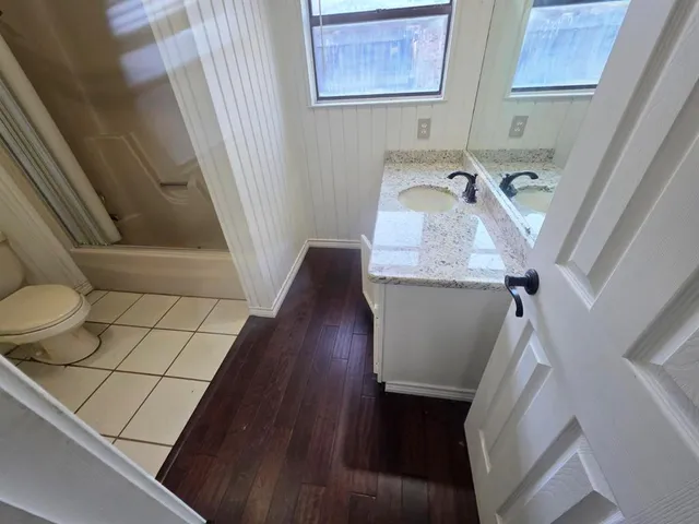 a view of balcony with furniture