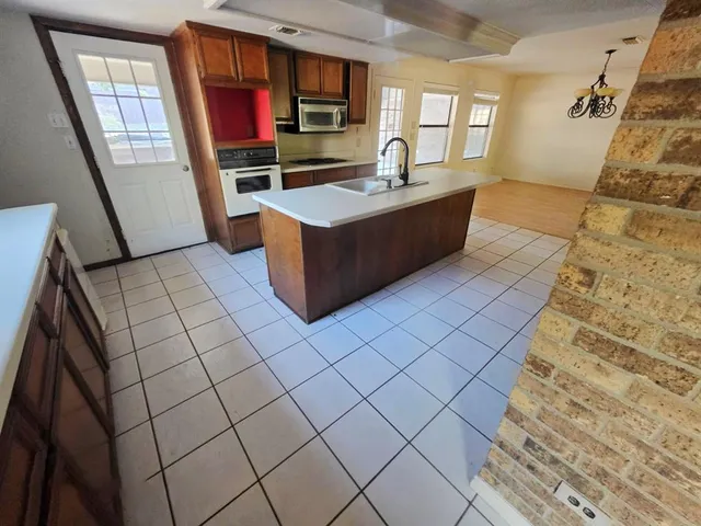 a living room with a couch and a flat screen tv