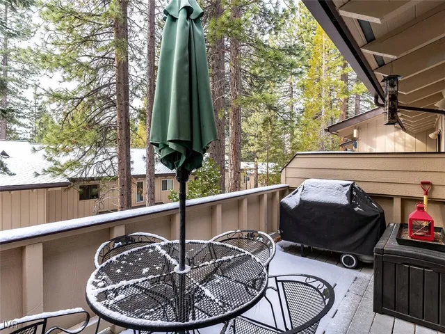 a living room with furniture fireplace and flat screen tv