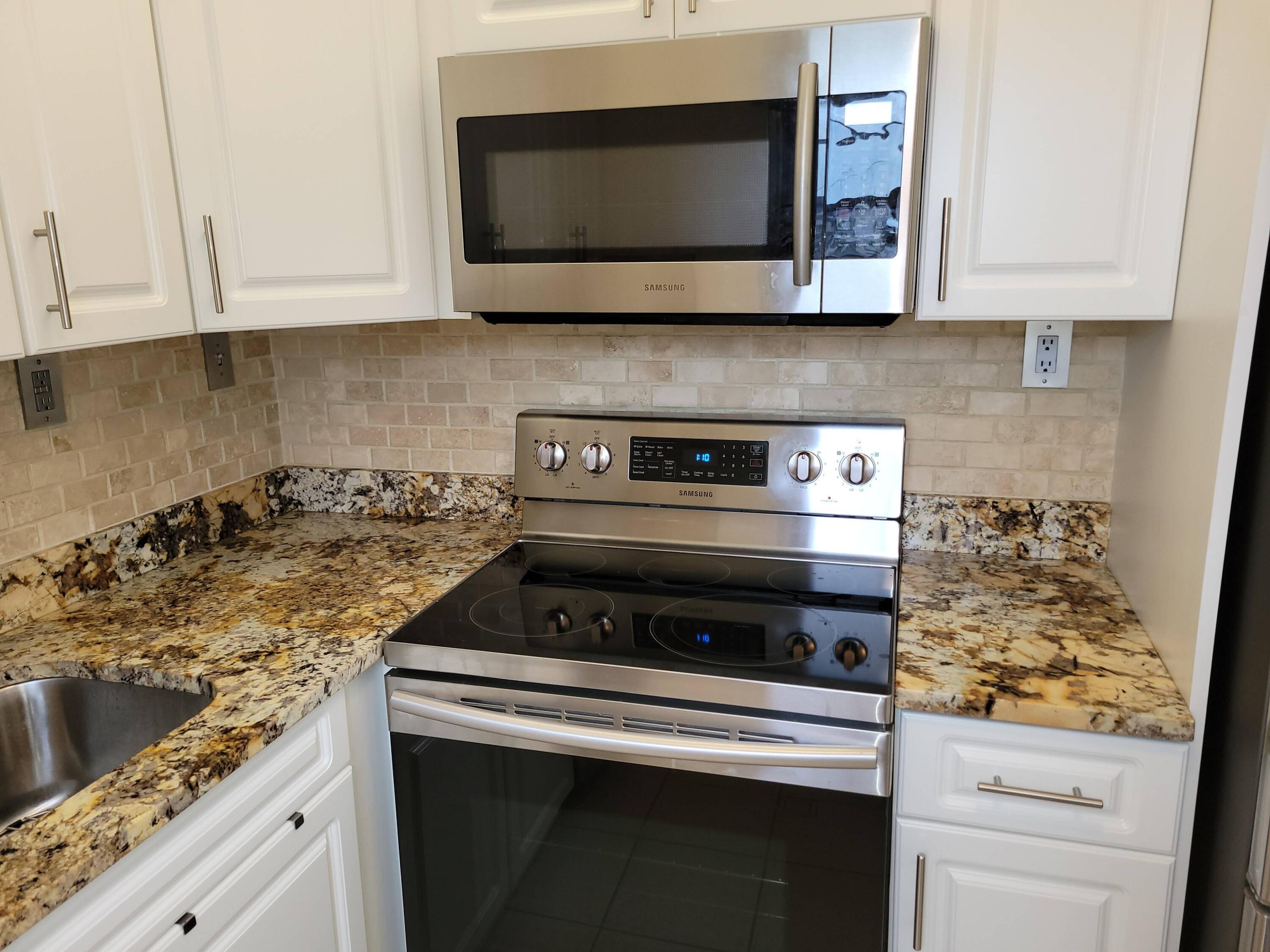 207 Fanshaw East Boca Raton, FL 33434 - Photo 4 of 52 20210623_163633