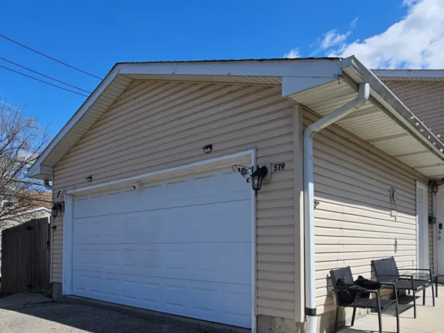 a kitchen with a sink cabinets and appliances