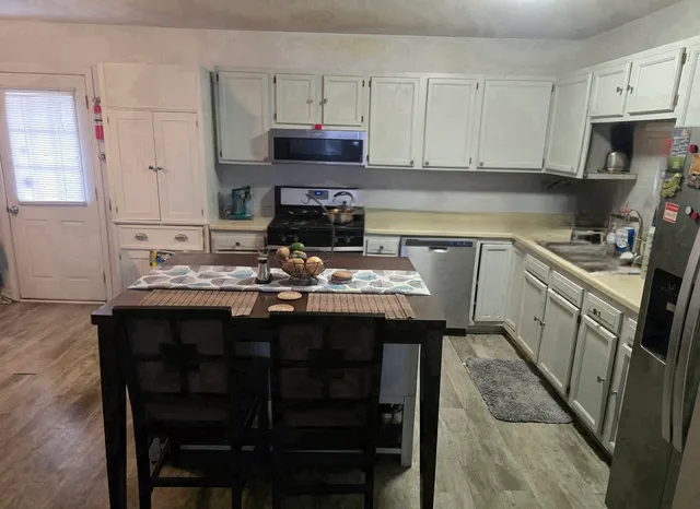 a living room with furniture and a couch