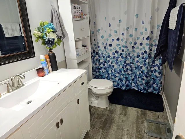 a view of a pathway with a backyard