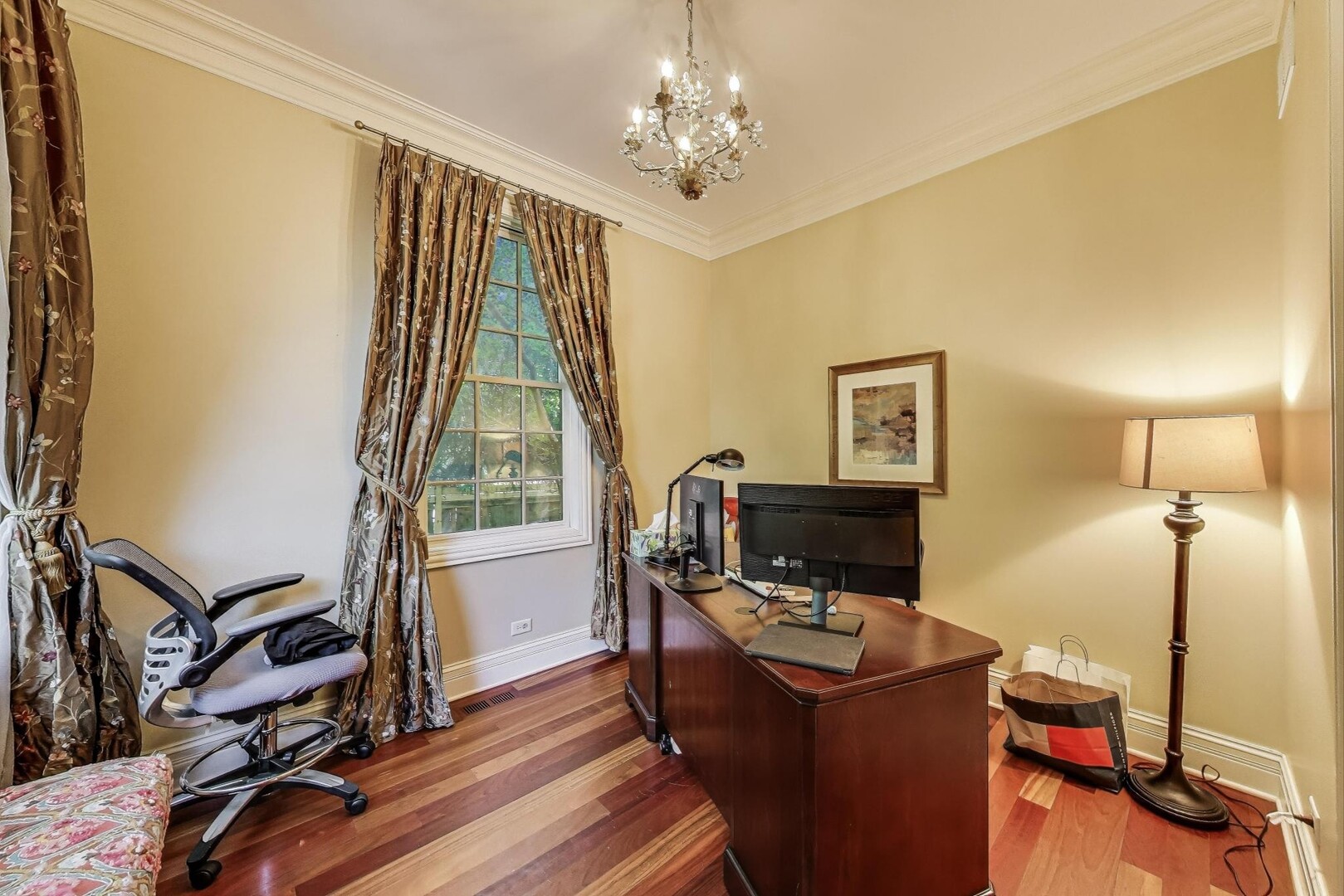 901 Pontiac Road Wilmette, IL 60091 - Photo 11 of 35 a view of a workspace with furniture and a window