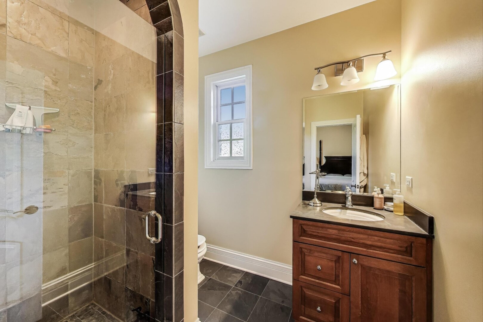 901 Pontiac Road Wilmette, IL 60091 - Photo 16 of 35 a bathroom with a double vanity sink mirror and shower