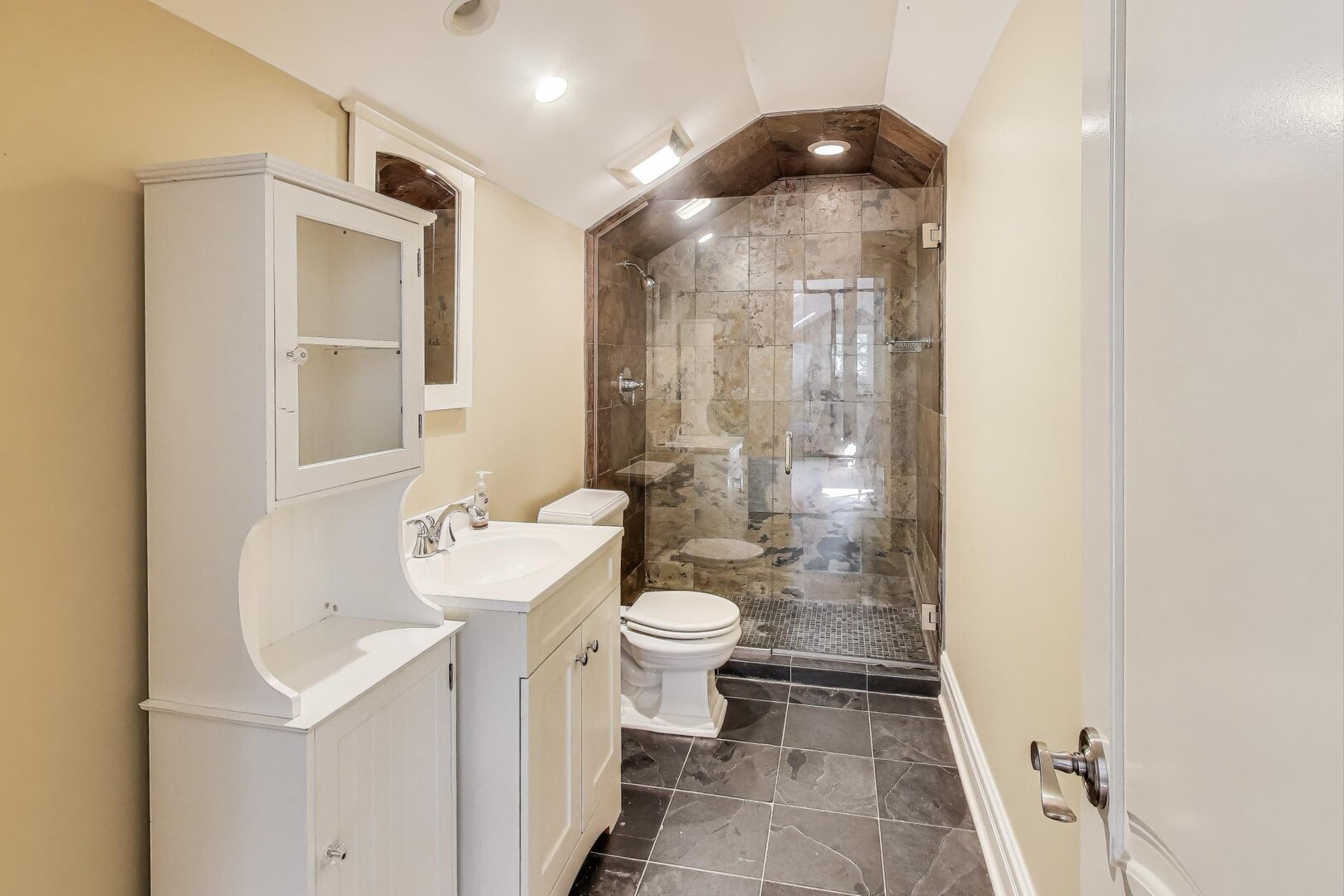 901 Pontiac Road Wilmette, IL 60091 - Photo 21 of 35 a bathroom with a sink a toilet and shower