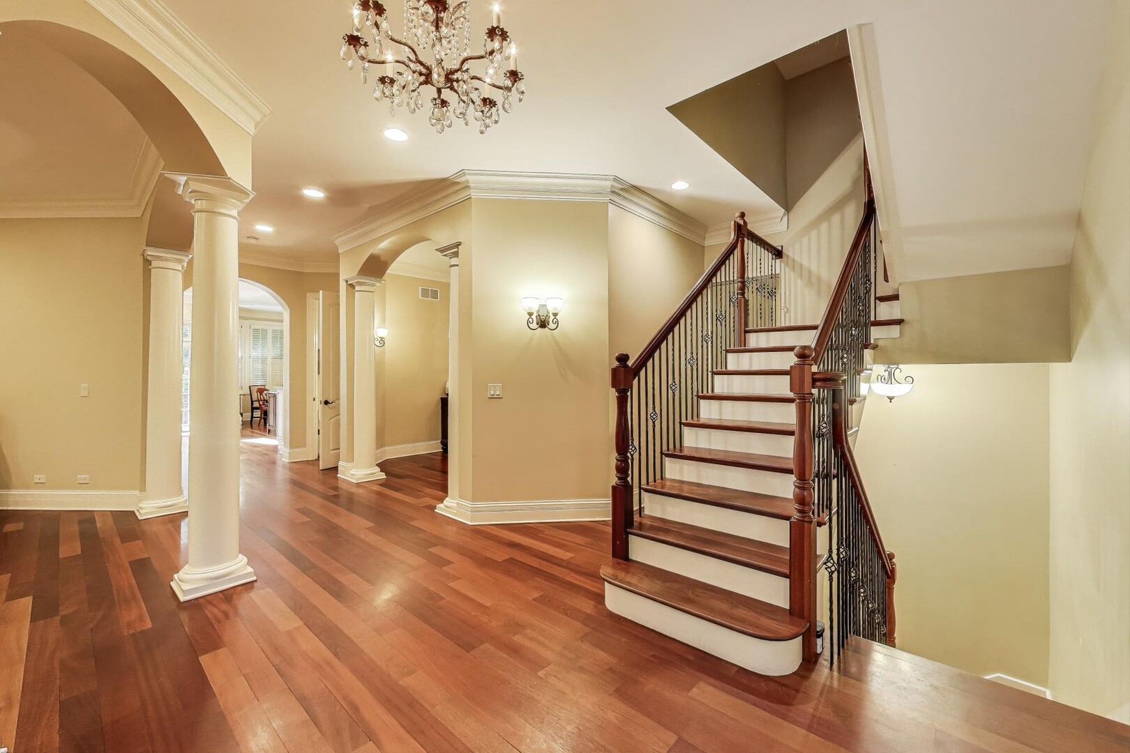 901 Pontiac Road Wilmette, IL 60091 - Photo 3 of 35 a view of a hallway with wooden floor and staircase