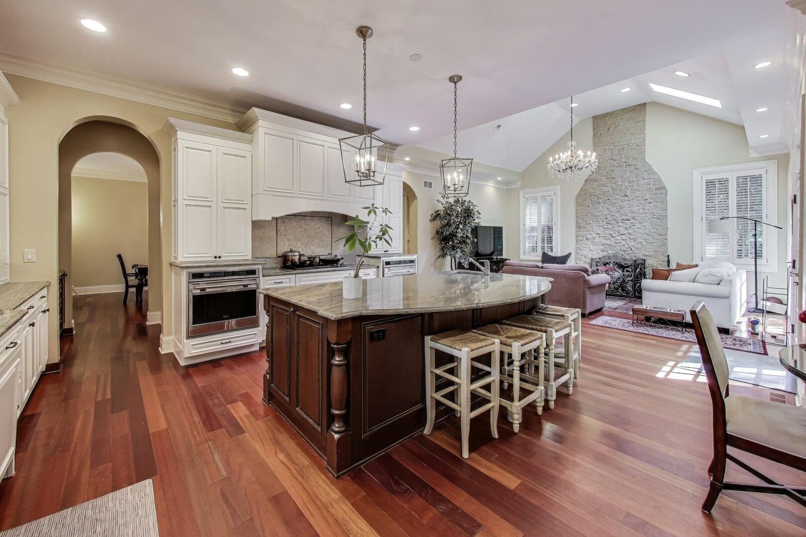901 Pontiac Road Wilmette, IL 60091 - Photo 7 of 35 a large kitchen with a table and chairs