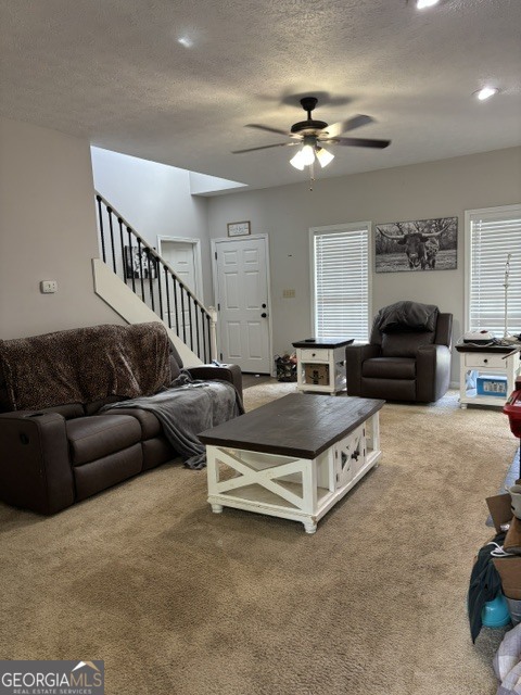 771 Hamilton Road Concord, GA 30206 - Photo 3 of 30 a spacious bedroom with a bed a couch and chandelier