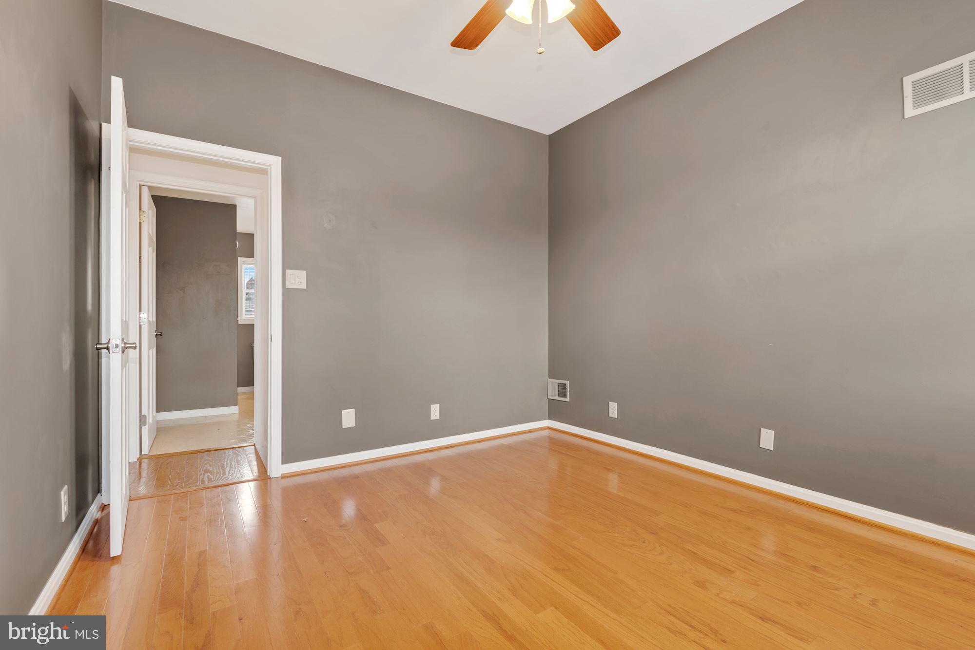 1445 Andre Street Baltimore, MD 21230 - Photo 12 of 22 an empty room with closet and window