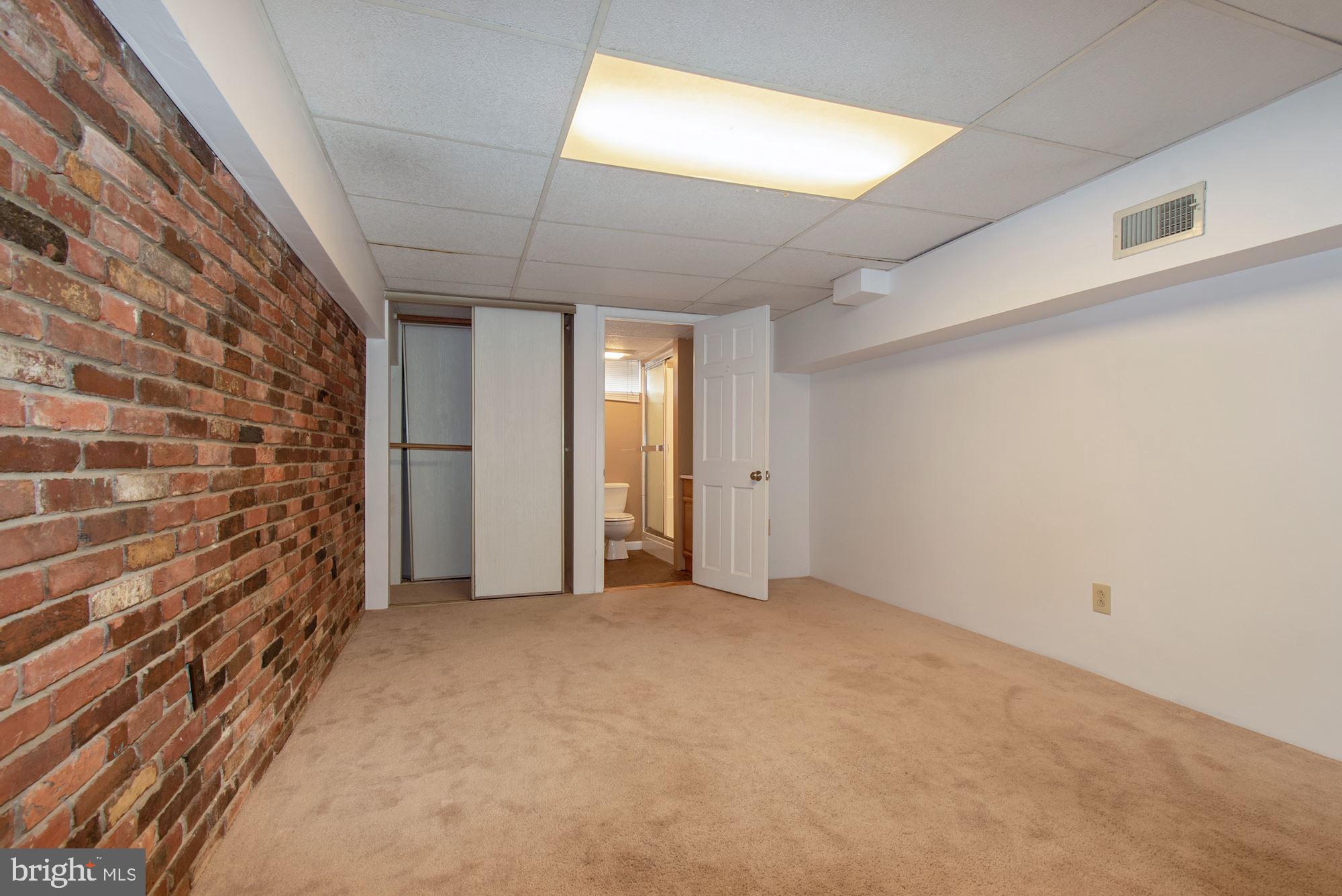 1445 Andre Street Baltimore, MD 21230 - Photo 17 of 22 a view of an empty room with a window