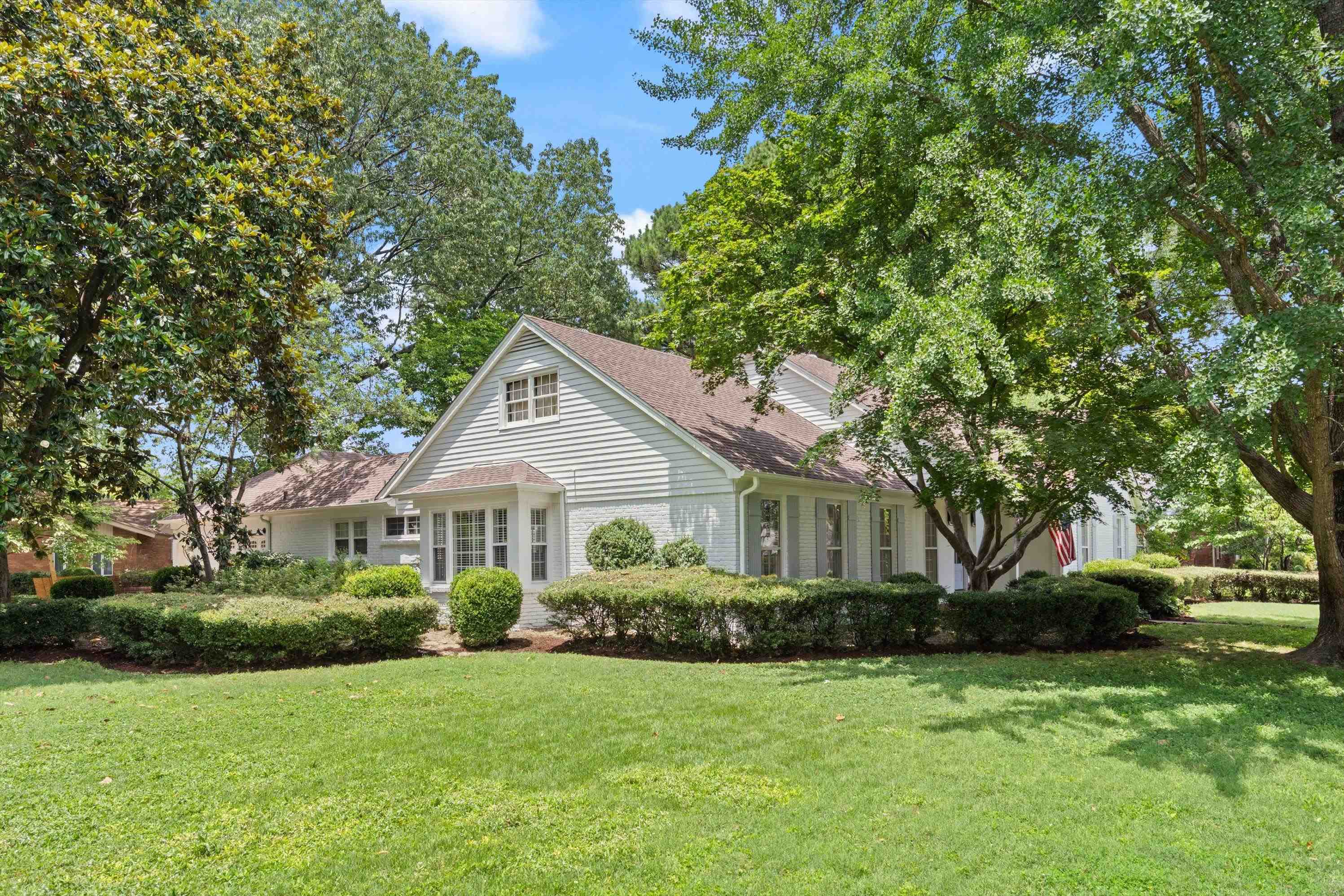 839 Reddoch Street Memphis, TN 38119 - Photo 2 of 36 a front view of a house with a yard