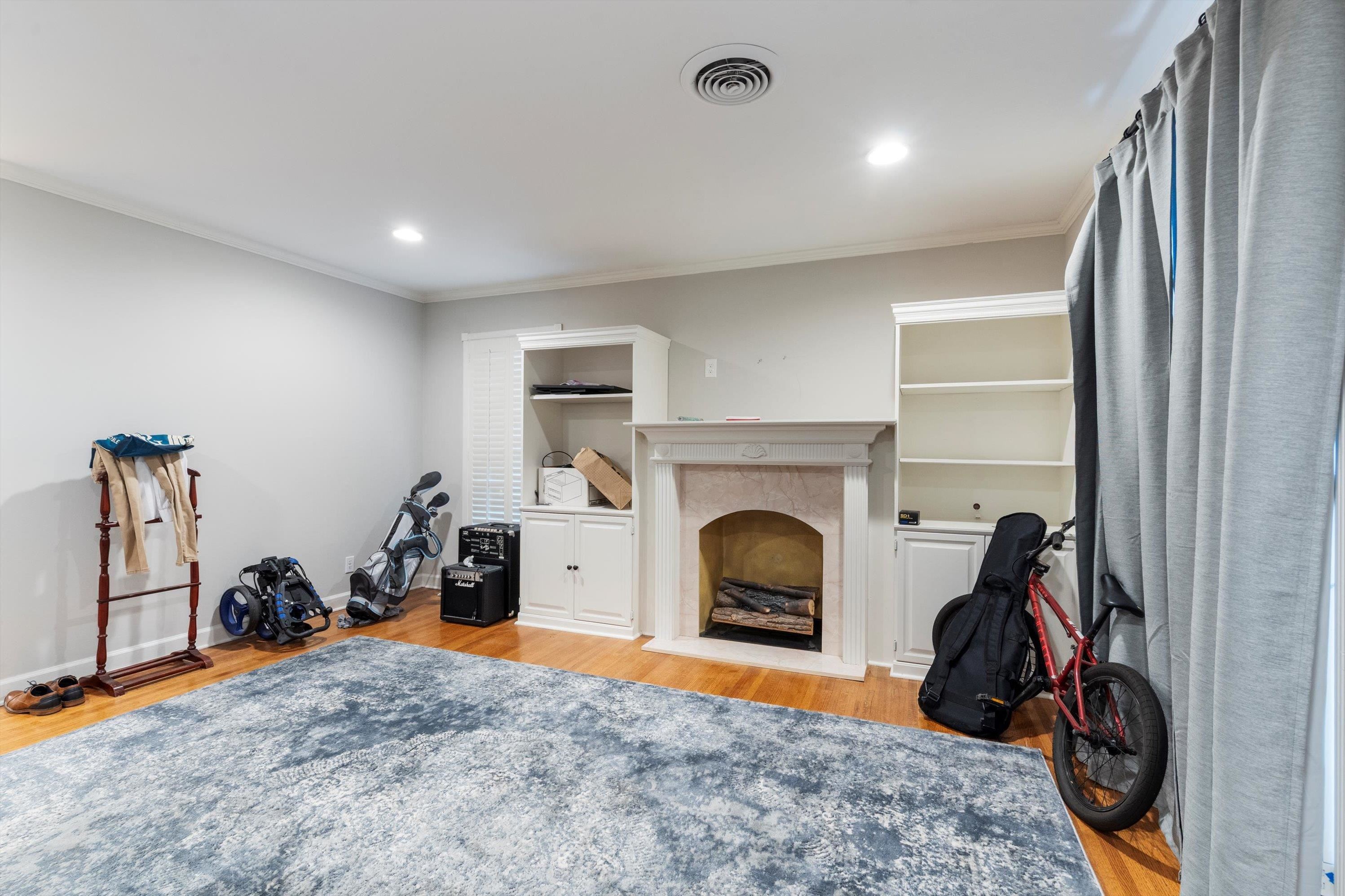 839 Reddoch Street Memphis, TN 38119 - Photo 23 of 36 a room with furniture and a fireplace