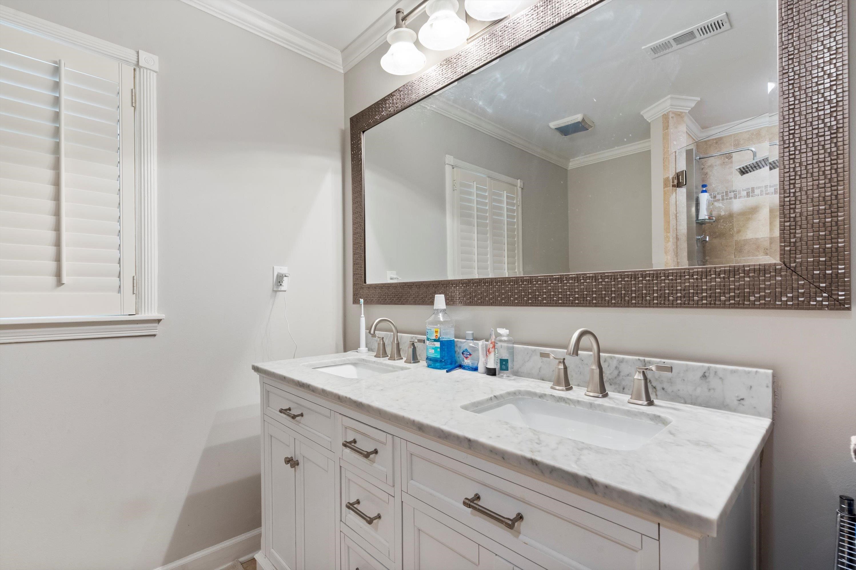 839 Reddoch Street Memphis, TN 38119 - Photo 26 of 36 a bathroom with a sink and a mirror