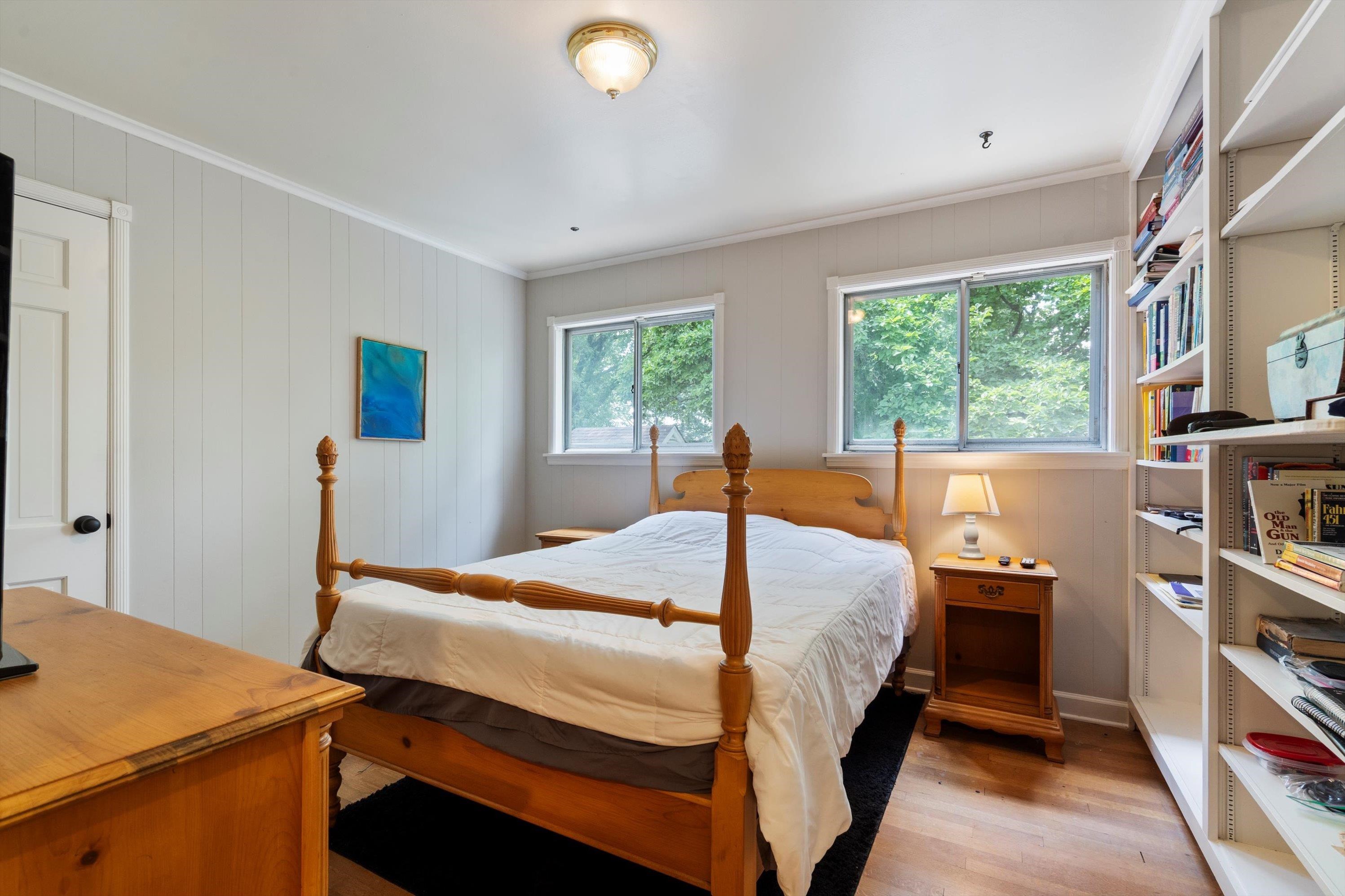 839 Reddoch Street Memphis, TN 38119 - Photo 28 of 36 a bedroom with a bed and a table in it