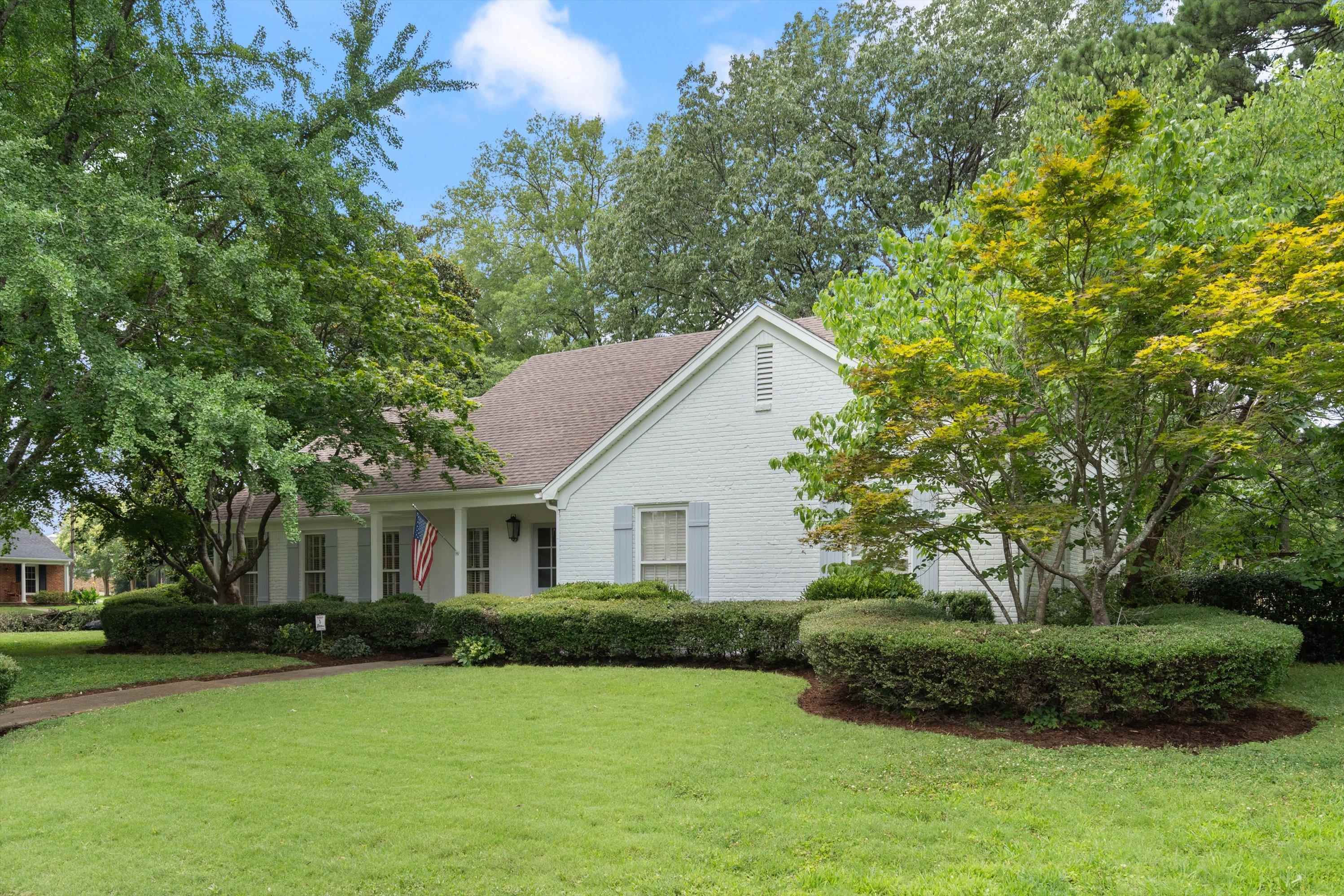 839 Reddoch Street Memphis, TN 38119 - Photo 3 of 36 a front view of a house with a yard