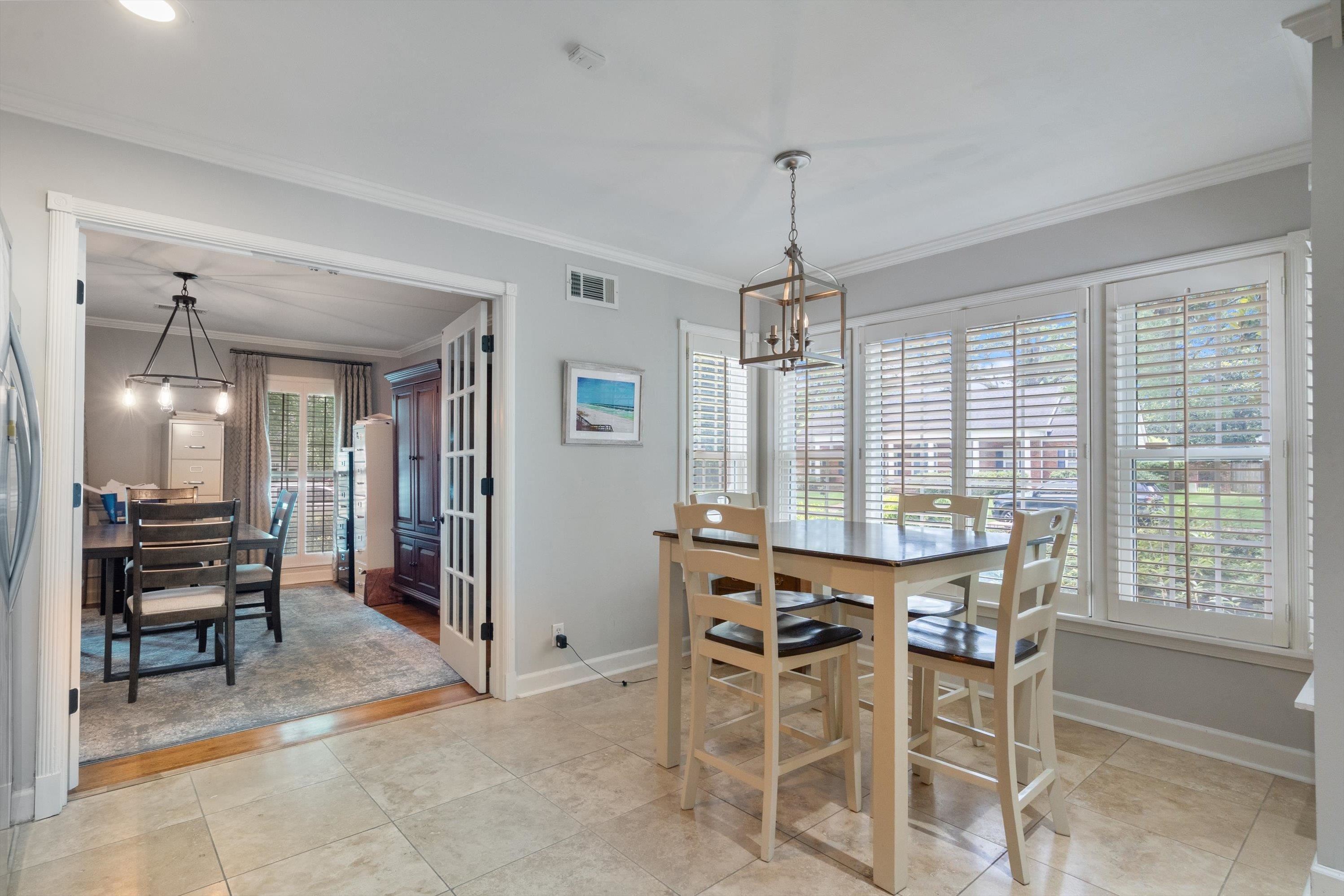 839 Reddoch Street Memphis, TN 38119 - Photo 8 of 36 a view of a dining room with furniture window and outside view