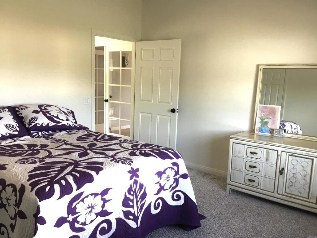 622 Rancho Del Cerro Fallbrook, CA 92028 - Photo 20 of 58 a bedroom with a bed and a window