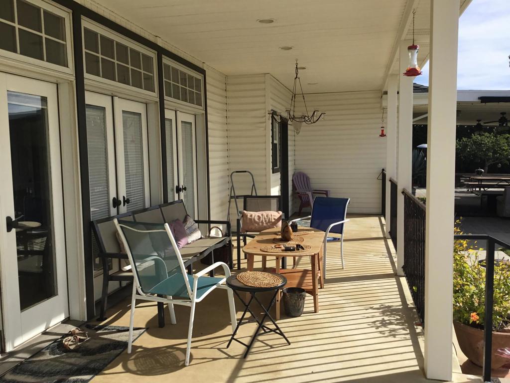 622 Rancho Del Cerro Fallbrook, CA 92028 - Photo 31 of 58 a view of a patio with table and chairs