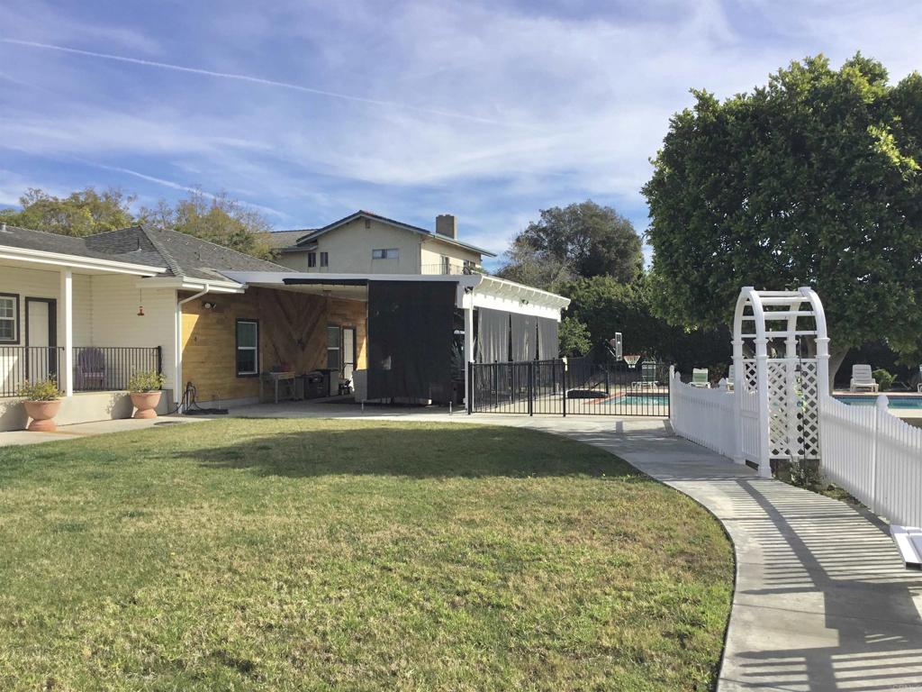 622 Rancho Del Cerro Fallbrook, CA 92028 - Photo 33 of 58 a front view of a house with a garden