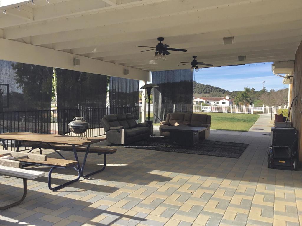 622 Rancho Del Cerro Fallbrook, CA 92028 - Photo 36 of 58 a living room with furniture and a large window
