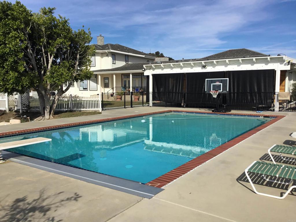 622 Rancho Del Cerro Fallbrook, CA 92028 - Photo 37 of 58 a view of a house with a swimming pool