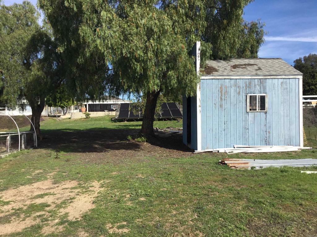 622 Rancho Del Cerro Fallbrook, CA 92028 - Photo 39 of 58 a backyard of a house with yard and trampoline