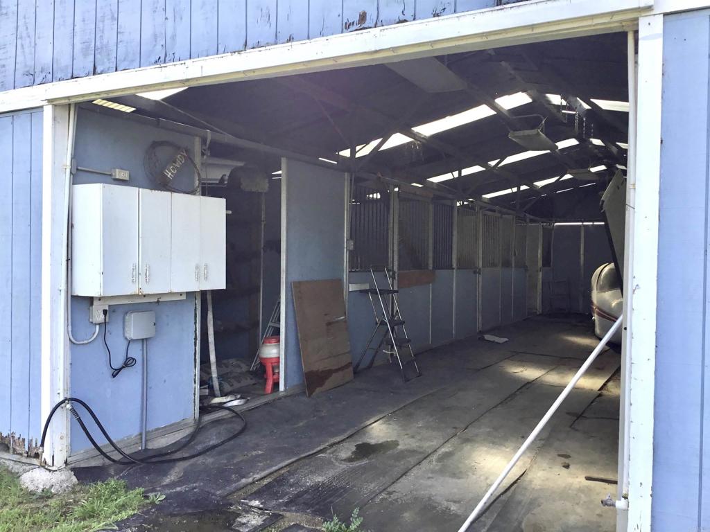 622 Rancho Del Cerro Fallbrook, CA 92028 - Photo 42 of 58 a room with water heater and a table