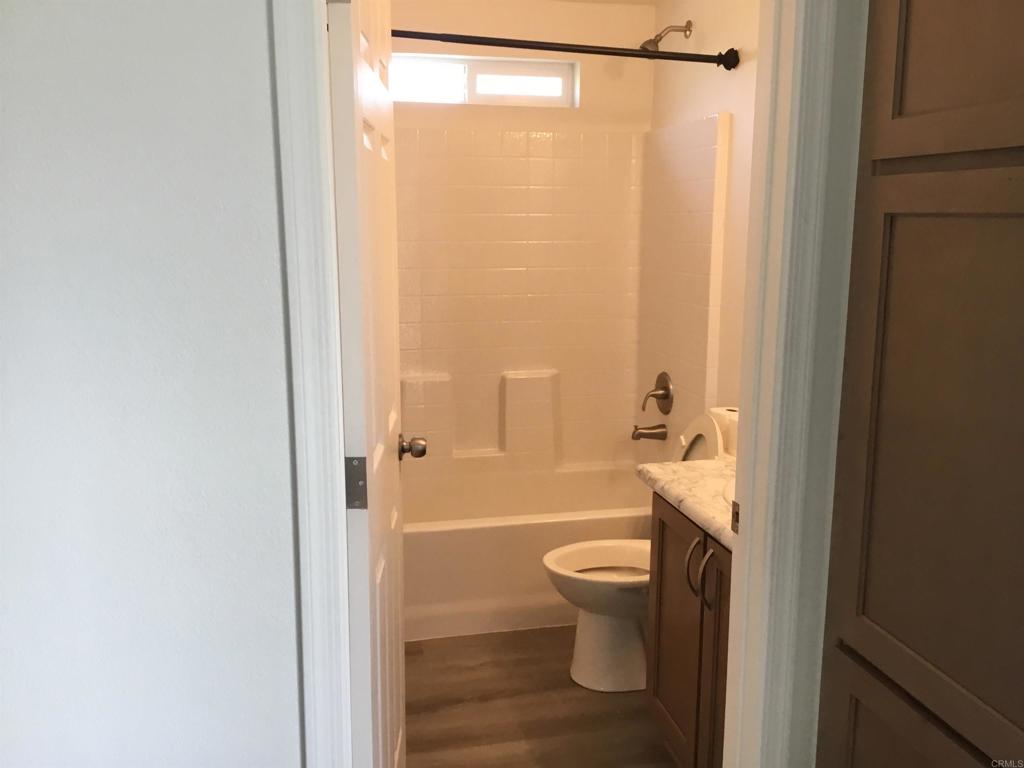 622 Rancho Del Cerro Fallbrook, CA 92028 - Photo 53 of 58 a bathroom with a shower a toilet and a sink